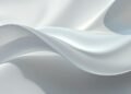 Modern artifact with sleek curves resting on a minimalist background.